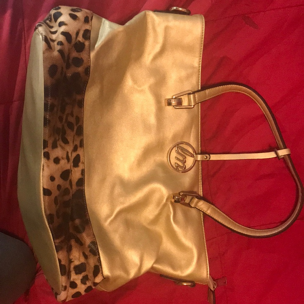 Tan/gold sack pocketbook with leopard print